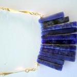 Dark Blue Stone Necklace In Tribal Style With Gold..