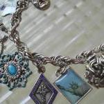 Charm Bracelet With Vintage Charms In Silver Metal